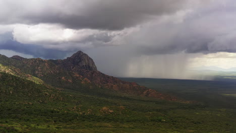 Monsoon-rain-behind-elephant-head-with-lightening,-Madera-Canyon,-Arizona