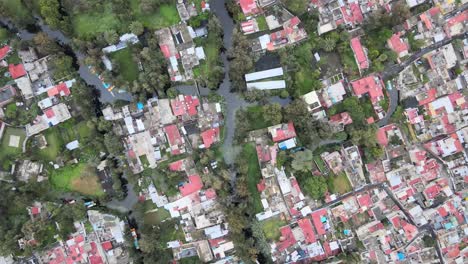 Zenith-view-above-canals-and-houses-of-Xochimilco,-Mexico-City