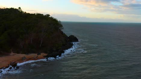 Aerial-View-Of-Palm-Cove-In-The-Coastal-Of-Cairns-In-Queensland,-Australia---drone-shot