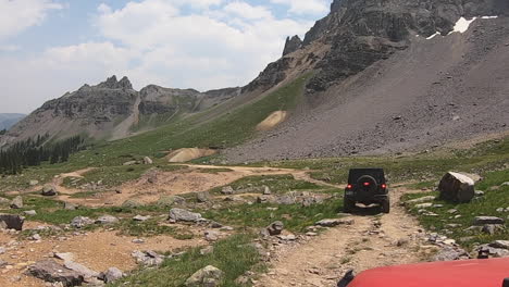 Following-4WD-vehicle-moving-along-rocky-portion-of-Sidney-Basin-Loop-Trail-in-the-Yankee-boy-Basin-of-the-San-Juan-Mountains-in-Colorado