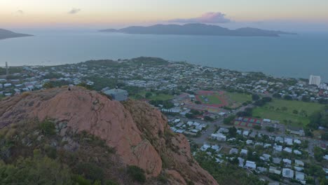 People-On-Top-Of-Granite-Monolith-Boulder-Viewing-Cleveland-Bay-And-Magnetic-Island-In-The-Morning