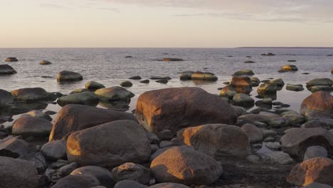 Rounded-rocks-in-shallows-of-Baltic-Sea-coastline,-northern-Estonia