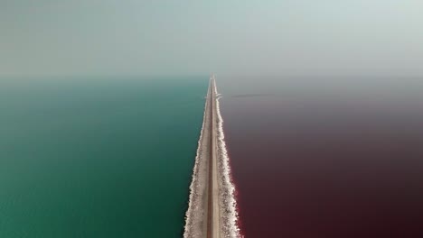 AWESOME-AERIAL-FROM-PINK-AND-BLUE-LAKE-OVER-THE-GREAT-SALT-LAKE-IN-UTAH