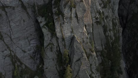 Breathtaking-drone-aerial-reveal-of-a-massive-mountain-in-the-italian-alps,-Monte-Congen,-valchiavenna,-villa-di-chiavenna,-italy