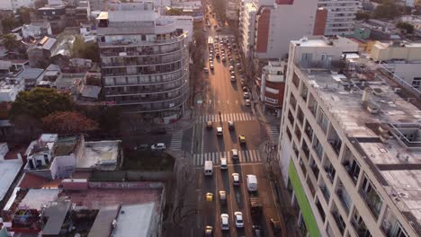 AERIAL---Traffic-in-large-avenue-in-Palermo,-Buenos-Aires,-Argentina,-forward