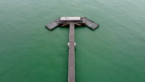 4K-drone-footage-slowly-flying-over-the-top-of-Deal-pier-in-Kent-UK