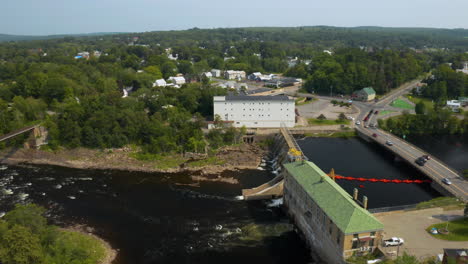 Pan-up-aerial-footage-of-Hydroelectric-Dam-in-Skowhegan,-Maine