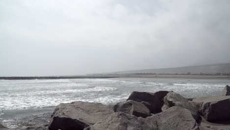 Looking-out-over-the-calm-ocean-waves-at-Playa-Salverry-beach,-Trujillo,-La-Libertad,-Peru