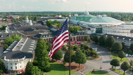 American-flag-waves-in-breeze-at-Gaylord-Opryland-Hotel-and-Convention-Center-in-Nashville-Tennessee,-TN,-USA