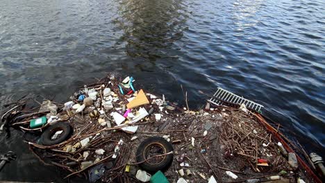 Plastic-bottles,-bags-and-other-garbage-dumped-on-water-in-Manchester