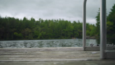 Low-angle-view-of-dock-on-water-on-a-cloudy-day