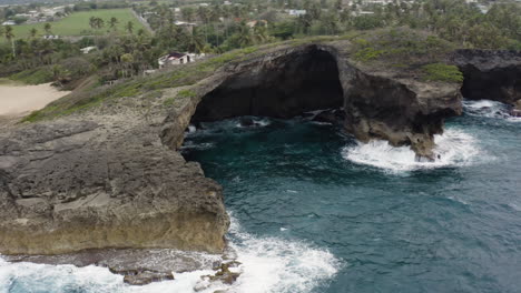 Rocky-Shoreline-And-Ocean-At-Punta-Las-Tunas-And-Cueva-del-Indio-Of-North-Coast-Puerto-Rico---aerial-drone-shot