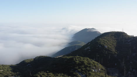 Sea-of-Clouds-Next-To-Mountain-Hill-Ridge