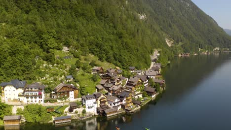 Birds-Eye-View-of-Traditional-Homes-Next-to-Hallstatt-Lake-in-Austrian-Mountain-Village