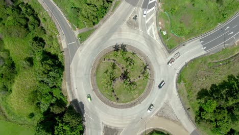 Time-lapse-shot-of-vehicles-on-a-rural-roundabout-junction