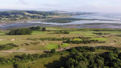 Aerial-View-Across-Dawlish-Golf-Course-Near-Sand-Pits-And-Mouth-Of-River-Exe