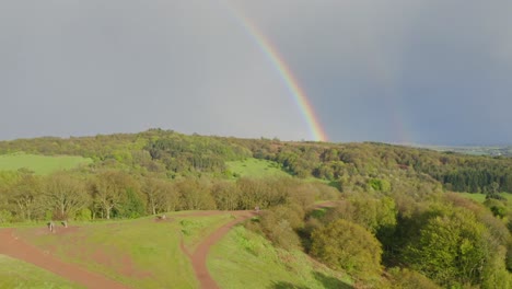 A-beautiful-double-Rainbow-over-the-lush-green-landscapes-of-Clent-Hills-in-rural-Worcestershire