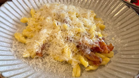 Homemade-pasta-with-carbonara-sauce-and-cheese