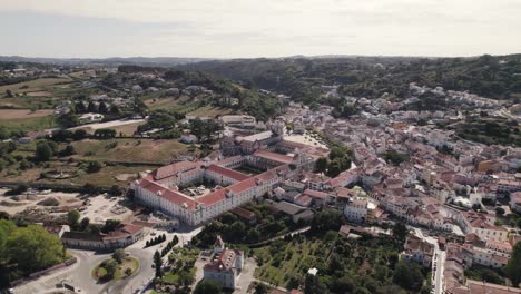 Aerial-dolly-out-from-the-magnificent-monastic-building,-Monastery-of-Santa-Maria-d'Alcobaça