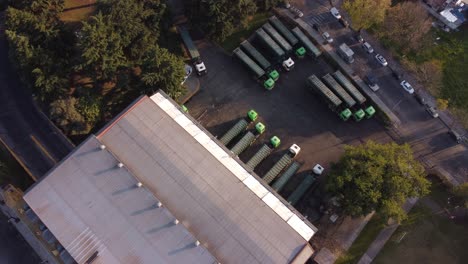 Aerial-top-down-shot-showing-parking-trucks-of-waste-to-energy-plant-in-Buenos-Aires