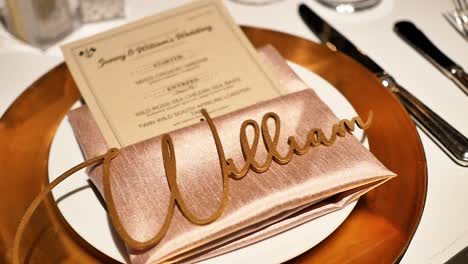 Close-Up-of-Dinner-Plate-and-Tableware-at-Wedding,-Decoration-Spelling-William