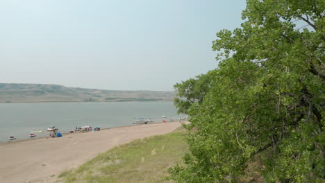 Revealing-Shot-Of-Boats-At-The-Lakeside-in-Saskatchewan-Landing-Provincial-Park-In-Canada
