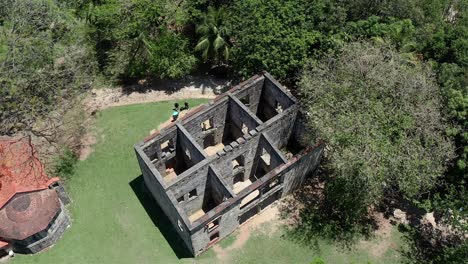 Aerial-view-over-the-historic-ruined-house-of-the-Engombe-Mill,-an-architectural-structure-dating-from-the-Colonial-era