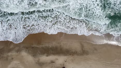 take-aerial-of-the-sea-and-the-waves