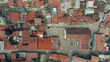 Top-Down-View-Of-Rooftops-In-The-Town-Of-Santa-Catarina-Palopo,-Lake-Atitlan,-Guatemala---drone-shot