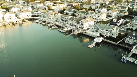 Tilt-up-Ariel-of-the-harbor-and-nice-harbor-houses-in-Stone-Harbor,-New-Jersey