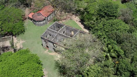Drone-shot-over-the-ruins-of-the-Engombe-Mill,-an-architectural-structure-from-the-colonial-era