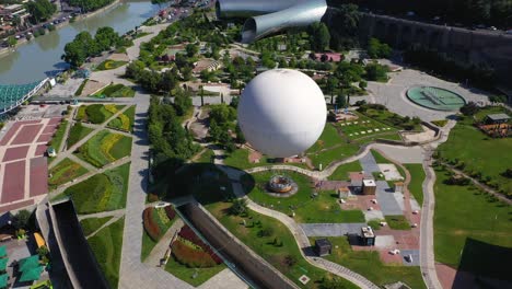 Aerial:-Tbilisi-Rike-Park-and-air-balloon-tourist-attraction-in-Georgia