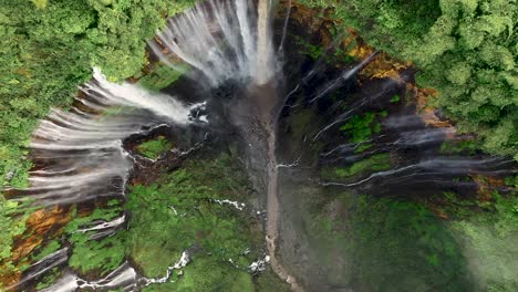 View-from-above,-stunning-drone-footage-of-the-Tumpak-Sewu-Waterfalls-Coban-Sewu