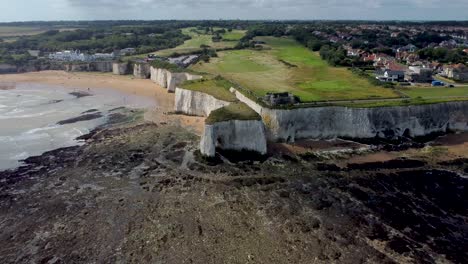 Aerial-View-Of-White-Chalk-Cliffs-And-Neptune's-Tower-At-Kingsgate-Bay