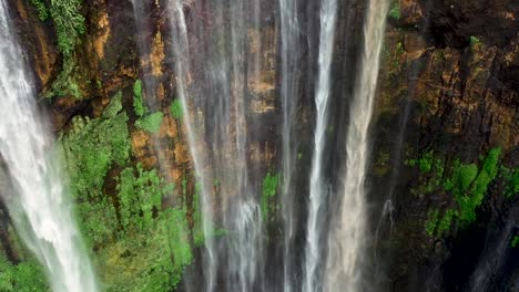 View-from-above,-stunning-aerial-footage-of-the-Tumpak-Sewu-Waterfalls-Coban-Sewu