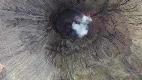 Crater-with-active-volcano-smoke-in-East-Java,-Indonesia