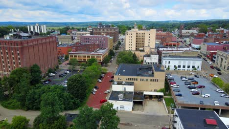 Aerial-drone-footage-of-downtown-Jamestown,-New-York,-during-summer-time-on-a-sunny-day