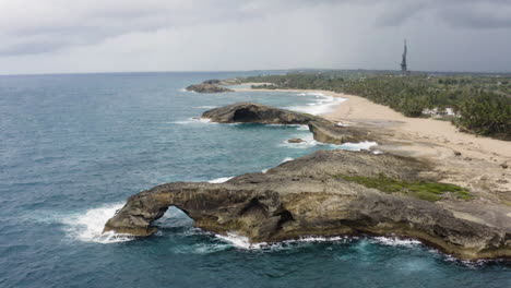 Rugged-Landscape-And-Rocky-Outcrops-Along-North-Coast-Of-Puerto-Rico-At-Punta-Las-Tunas-And-Cueva-del-Indio---aerial-drone-shot