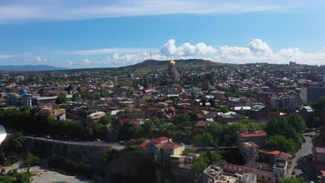 Aerial-time-lapse-over-Tbilisi-city-centre,-Georgia-capital-city
