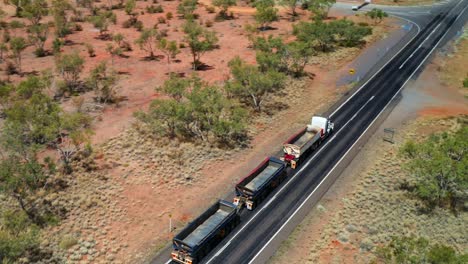 Empty-Three-trailer-Road-Train-Driving-On-The-Highway-In-Queensland,-Australia