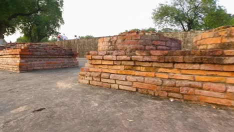 The-Ancient-Ruins-of-the-Archaeological-Site-in-Sanarth,-Varanasi,-India-with-Close-Up-of-Brick-Pedestals