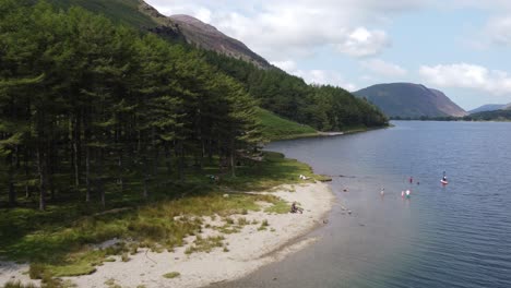 Buttermere-Lake-District-UK-aerial-footage-of-stunning-landscape-people-swimming