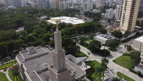 panoramic-drone-view-showing-from-above-the-Church-of-Jesus-Christ-of-Latter-day-Saints-and-its-golden-statue-in-the-chasm
