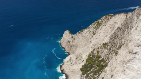 Beautiful-white-Zakynthos-cliffs-by-the-hidden-beaches-in-Greece--Aerial