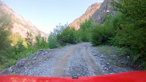 Following-4WD-vehicle-driving-on-trail-in-the-Yankee-boy-Basin-of-the-San-Juan-Mountains-in-Colorado