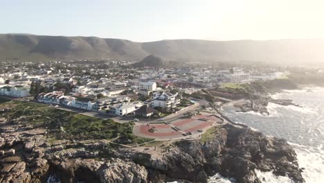 Aerial-View-Of-Gearings-Point-And-Hermanus-Whale-Watching-View-Point-At-Sunrise-In-Hermanus,-South-Africa