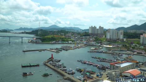 Fishing-Boats-Docked-On-Marina-In-Gyeongsangnam-do,-Geojedo-Island,-South-Korea