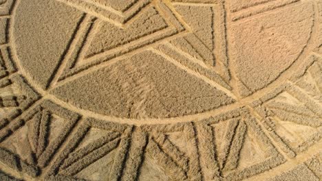 Overlapping-West-Meon-mysterious-crop-circle-pattern-aerial-view-descending-low-above-farmland