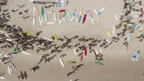 4k-Top-view-drone-shot-of-the-protest-against-norwegian-oil-company-at-Byron-Bay,-New-South-Wales,-Australia---2019