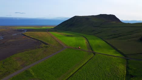 Aerial-View-Of-Lush-Green-Landscape-Near-Seljavallalaug-In-Southern-Iceland